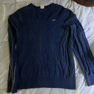 Blue sweater. Size small.